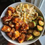 Maple Garlic Chicken Bites with Spicy Cajun Alfredo and Crispy Brussels Twists