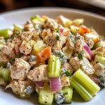 blue cheese chicken salad, showcasing a vibrant mix of shredded chicken,