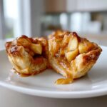 Salted caramel apple tartlets with a crisp, flaky crust.