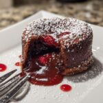 Chocolate Lava Cake with raspberry drizzle