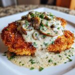 Golden crispy chicken with parmesan mushroom sauce
