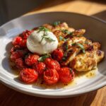 Juicy chicken fillets with oven-baked tomatoes and creamy burrata