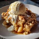 Warm Apple Crumble with vanilla ice cream