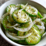 cucumbers and onions in vinegar